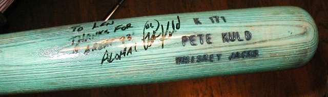 Close up of autograph and stamping on bat